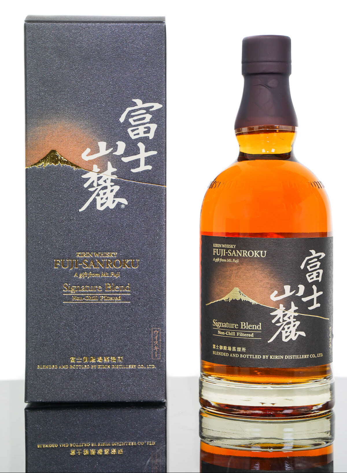 Whiskey bottle with packaging featuring Japanese text and mountain design